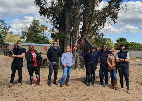 Malan with wife Finnie (light blue), and daughter Karien Lutz with her showjumper, Zoid.