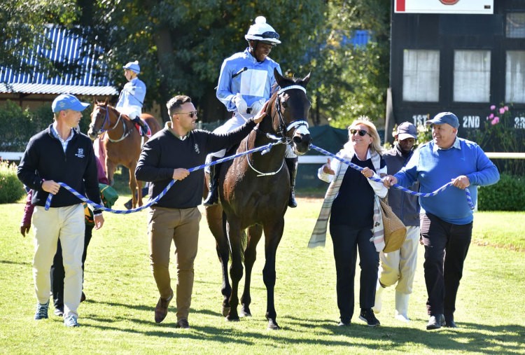 Supreme Warrior with his winning connections. (JC Photos).